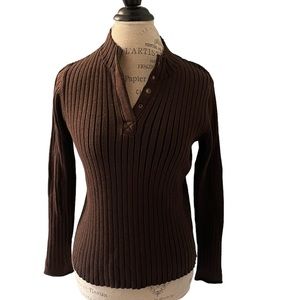 Women’s chocolate brown flattering sweater. Size Med, but fits more like a SM.